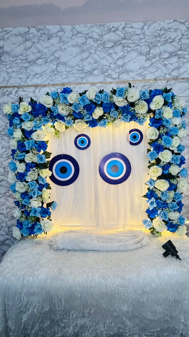 Ganpati Decoration Kit – Blue & White Floral Backdrop with Evil Eye Hangings