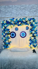 Ganpati Decoration Kit – Blue & White Floral Backdrop with Evil Eye Hangings